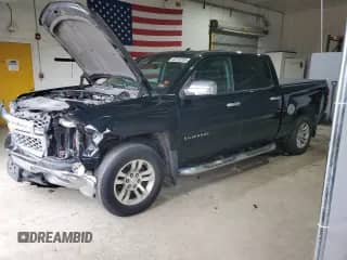 2014 Chevrolet Silverado 1500 LT with VIN 3GCUKREC2EG316134, listed as a Copart auction lot 48743595 with 134,696 mi miles and Salvage title. Bid and sale history available at DreamBid. Image 1.