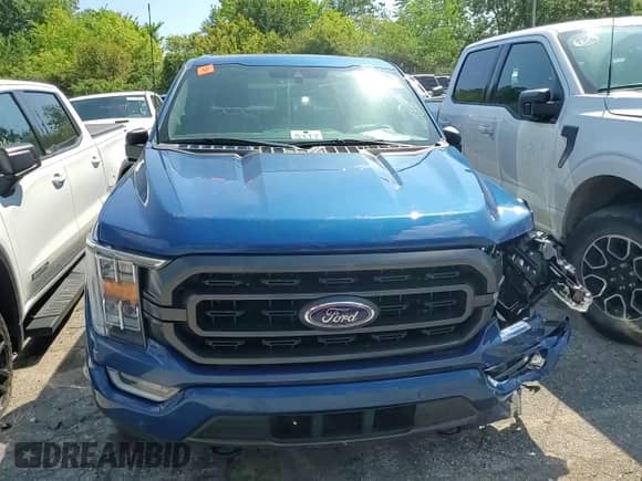 2023 Ford F-150 XL z VIN 1FTEW1EP1PKD08650, wystawiony jako Copart lot #68836925 z przebiegiem 31 390 mil mil oraz Szkoda całkowita • Salvage title. Historia ofert i sprzedaży dostępna na DreamBid. Obrazek 13.