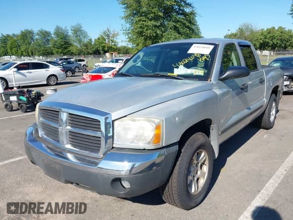 2005 Dodge Dakota SLT with VIN 1D7HW48N05S177433, listed as a IAAI auction lot 43024048 with 141,066 mi miles and . Bid and sale history available at DreamBid. Image 6.