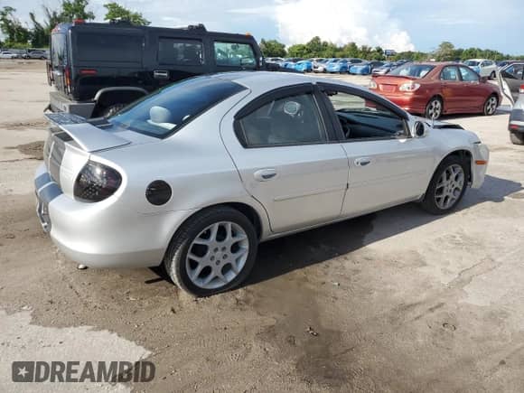 2000 Dodge Neon Highline with VIN 1B3ES46C9YD691348, listed as a Copart auction lot 69740835 with 205,868 mi miles and Salvage title. Bid and sale history available at DreamBid. Image 3.