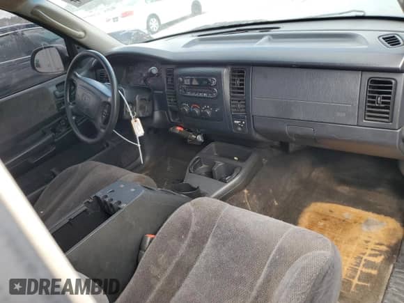 2004 Dodge Dakota с VIN 1D7FL46N44S634830, выставлен на аукционе Copart как лот 69702714 с пробегом 306 816 миль миль и Списание • Salvage title. История ставок и продаж доступна на DreamBid. Изображение 8.