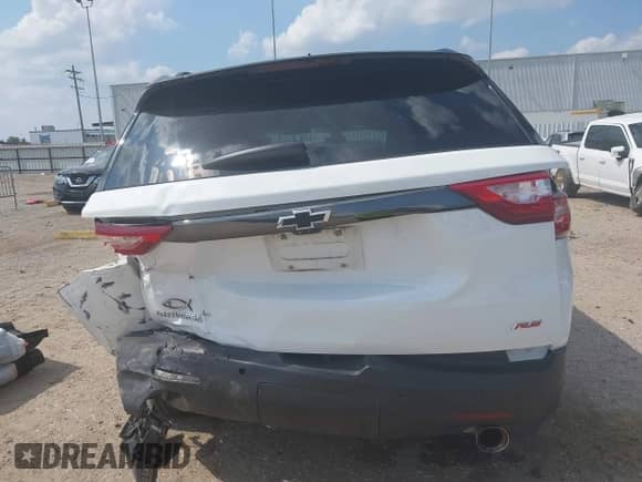 2020 Chevrolet Traverse RS z VIN 1GNERJKW1LJ216870, wystawiony jako IAAI lot #42927420 z przebiegiem 83 893 mil mil oraz . Historia ofert i sprzedaży dostępna na DreamBid. Obrazek 16.