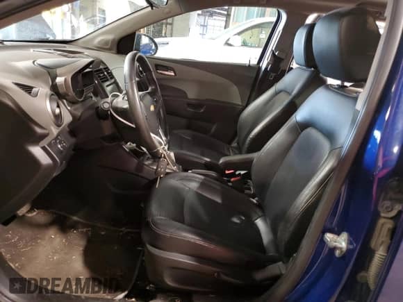 2014 Chevrolet Sonic LTZ с VIN 1G1JE6SB1E4111883, выставлен на аукционе Copart как лот 56010855 с пробегом 147 745 миль миль и Списание • Salvage title. История ставок и продаж доступна на DreamBid. Изображение 7.