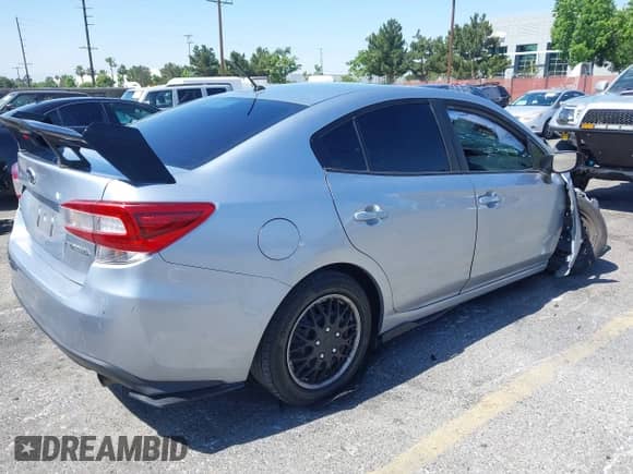 2022 Subaru Impreza with VIN 4S3GKAB63N3604437, listed as a IAAI auction lot 42386486 with 23,384 mi miles and . Bid and sale history available at DreamBid. Image 4.