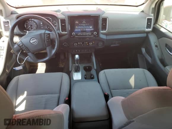 2023 Nissan Frontier SV with VIN 1N6ED1FK8PN612661, listed as a Copart auction lot 69260674 with 23,478 mi miles and Salvage title. Bid and sale history available at DreamBid. Image 8.