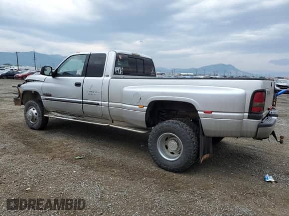 2002 Dodge 3500 с VIN 3B7MF33C62M221710, выставлен на аукционе Copart как лот 63832994 с пробегом 301 153 миль миль и Чистый • Clean title. История ставок и продаж доступна на DreamBid. Изображение 2.