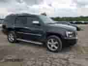 2011 Chevrolet Tahoe LTZ with VIN 1GNSKCE05BR254175, listed as a Copart auction lot 80693645 with 265,816 mi miles and Salvage title. Bid and sale history available at DreamBid. Image 4.