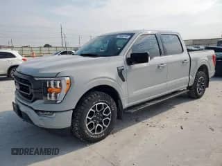 2023 Ford F-150 XL with VIN 1FTEW1CP4PKF65773, listed as a Copart auction lot 70465195 with 37,827 mi miles and Salvage title. Bid and sale history available at DreamBid. Image 1.