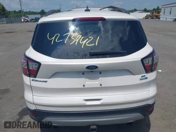 2018 Ford Escape SE z VIN 1FMCU9GD7JUC84120, wystawiony jako IAAI lot #42739421 z przebiegiem 81 295 mil mil oraz . Historia ofert i sprzedaży dostępna na DreamBid. Obrazek 16.