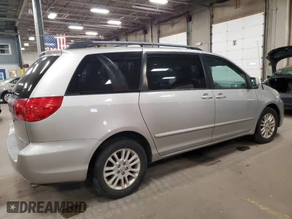 2010 Toyota Sienna XLE с VIN 5TDYK4CC1AS311946, выставлен на аукционе Copart как лот 86078525 с пробегом 193 862 миль миль и Списание • Salvage title. История ставок и продаж доступна на DreamBid. Изображение 3.
