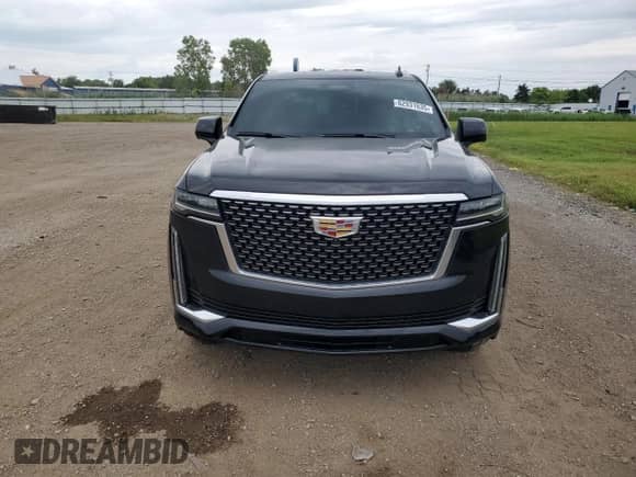 2021 Cadillac Escalade Premium Luxury with VIN 1GYS4BKL4MR474562, listed as a Copart auction lot 62931635 with 59,641 mi miles and Salvage title. Bid and sale history available at DreamBid. Image 5.