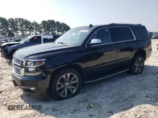 2017 Chevrolet Tahoe Premier with VIN 1GNSCCKC7HR386942, listed as a Copart auction lot 80673615 with 150,607 mi miles and Salvage title. Bid and sale history available at DreamBid. Image 1.