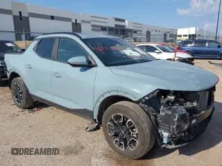 2022 Hyundai Santa Cruz SEL Premium с VIN 5NTJDDAF2NH039428, выставлен на аукционе IAAI как лот 43151690 с пробегом 27 984 миль миль и . История ставок и продаж доступна на DreamBid. Изображение 1.