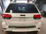 2018 Jeep Grand Cherokee SRT z VIN 1C4RJFDJ1JC270610, wystawiony jako IAAI lot #39955518 z przebiegiem 52 467 mil mil oraz . Historia ofert i sprzedaży dostępna na DreamBid. Obrazek 15.