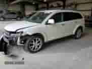 2013 Dodge Journey R/T with VIN 3C4PDDFG7DT627110, listed as a Copart auction lot 73490394 with 297,833 mi miles and Salvage title. Bid and sale history available at DreamBid. Image 1.