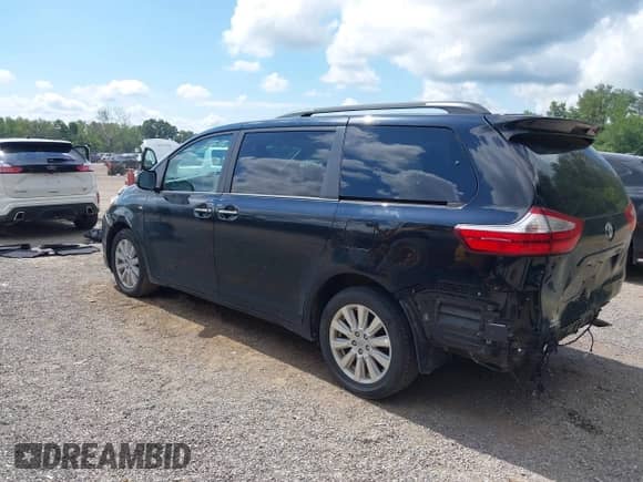 2017 Toyota Sienna XLE with VIN 5TDDZ3DC8HS182813, listed as a IAAI auction lot 43013976 with 124,184 mi miles and . Bid and sale history available at DreamBid. Image 3.