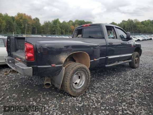 2009 Dodge RAM with VIN 3D3MX48L29G545944, listed as a Copart auction lot 80945355 with 110,299 mi miles and Salvage title. Bid and sale history available at DreamBid. Image 3.