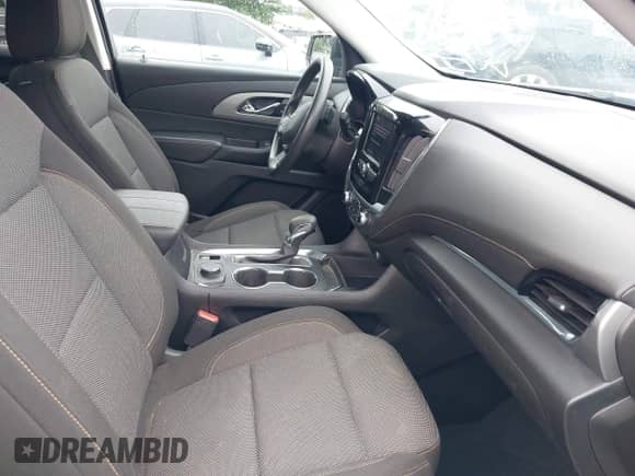 2021 Chevrolet Traverse LS with VIN 1GNEVFKWXMJ119788, listed as a IAAI auction lot 42706517 with 58,471 mi miles and . Bid and sale history available at DreamBid. Image 5.