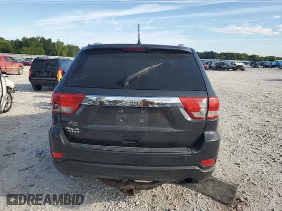 2011 Jeep Grand Cherokee Laredo с VIN 1J4RR4GG4BC590030, выставлен на аукционе Copart как лот 70199405 с пробегом 204 419 миль миль и Списание • Salvage title. История ставок и продаж доступна на DreamBid. Изображение 6.