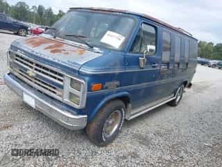1991 Chevrolet Chevy Van z VIN 2GBEG25K4M4126656, wystawiony jako IAAI lot #43427756 z przebiegiem 82 317 mil mil oraz . Historia ofert i sprzedaży dostępna na DreamBid. Obrazek 2.