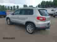 2011 Volkswagen Tiguan S with VIN WVGBV7AXXBW560022, listed as a IAAI auction lot 42693212 with 127,879 mi miles and . Bid and sale history available at DreamBid. Image 3.