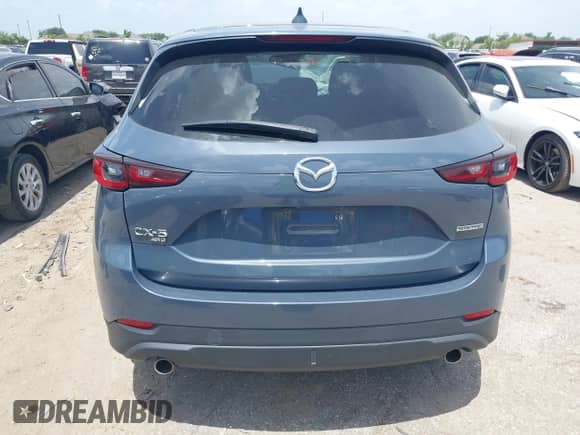 2022 Mazda CX-5 S Carbon Edition z VIN JM3KFBCM2N0571117, wystawiony jako IAAI lot #42535593 z przebiegiem 33 735 mil mil oraz . Historia ofert i sprzedaży dostępna na DreamBid. Obrazek 16.