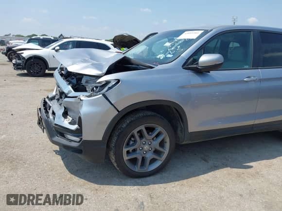 2022 Honda Passport EX-L with VIN 5FNYF8H56NB030824, listed as a IAAI auction lot 43089301 with 16,999 mi miles and . Bid and sale history available at DreamBid. Image 6.