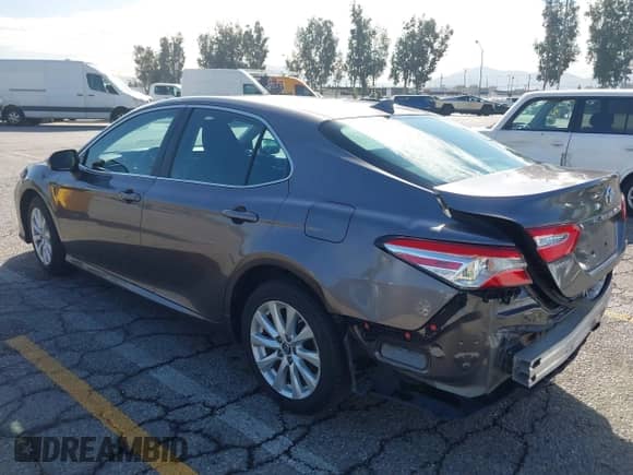 2019 Toyota Camry LE с VIN 4T1B11HK2KU715449, выставлен на аукционе IAAI как лот 43495656 с пробегом 82 639 миль миль и . История ставок и продаж доступна на DreamBid. Изображение 3.