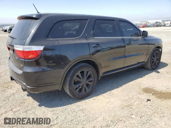 2012 Dodge Durango R/T with VIN 1C4SDHCT0CC362091, listed as a Copart auction lot 61875225 with 104,159 mi miles and Salvage title. Bid and sale history available at DreamBid. Image 3.