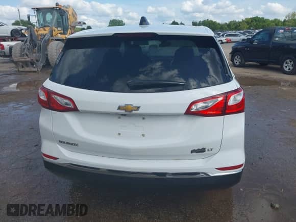2021 Chevrolet Equinox LT with VIN 3GNAXJEV2MS164401, listed as a IAAI auction lot 42821629 with 205,136 mi miles and . Bid and sale history available at DreamBid. Image 16.