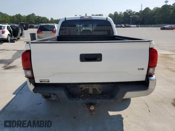 2018 Toyota Tacoma SR5 z VIN 5TFDZ5BN1JX038519, wystawiony jako Copart lot #80717275 z przebiegiem 158 659 mil mil oraz Szkoda całkowita • Salvage title. Historia ofert i sprzedaży dostępna na DreamBid. Obrazek 6.