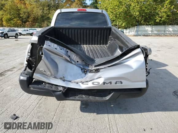 2018 Toyota Tacoma SR with VIN 5TFSX5EN2JX061445, listed as a Copart auction lot 81048405 with 63,722 mi miles and Salvage title. Bid and sale history available at DreamBid. Image 6.