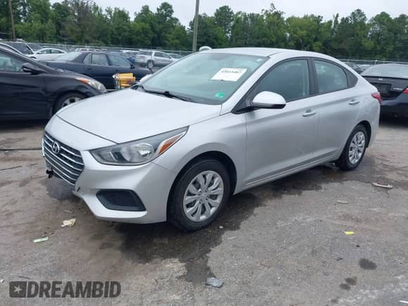 2022 Hyundai Accent SEL with VIN 3KPC24A6XNE157454, listed as a IAAI auction lot 43015407 with 94,500 mi miles and . Bid and sale history available at DreamBid. Image 2.