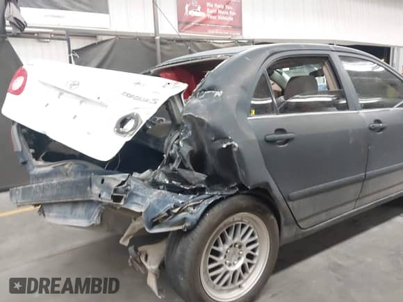 2003 Toyota Corolla LE with VIN 1NXBR32E33Z023841, listed as a IAAI auction lot 43304179 with 119,102 mi miles and . Bid and sale history available at DreamBid. Image 6.