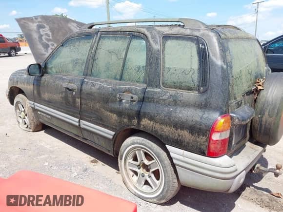2003 Chevrolet Tracker с VIN 2CNBJ134X36921126, выставлен на аукционе IAAI как лот 42536787 с пробегом 199 063 миль миль и . История ставок и продаж доступна на DreamBid. Изображение 3.