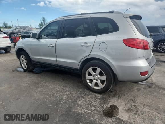 2009 Hyundai Santa Fe Limited с VIN 5NMSH73E39H282276, выставлен на аукционе Copart как лот 69031855 с пробегом 216 419 миль миль и Списание • Salvage title. История ставок и продаж доступна на DreamBid. Изображение 2.