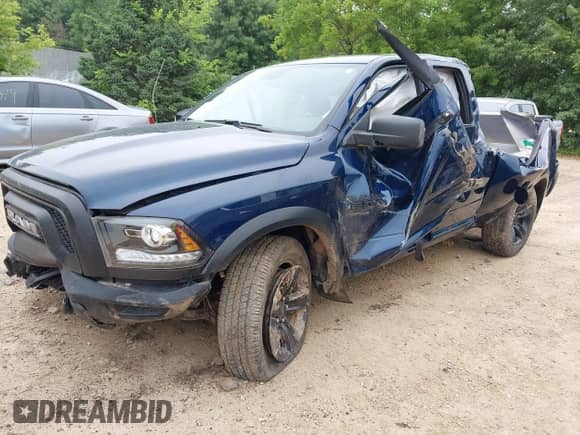 2022 Ram 1500 Warlock with VIN 1C6RR7GG9NS224041, listed as a IAAI auction lot 42579038 with 14,599 mi miles and . Bid and sale history available at DreamBid. Image 2.