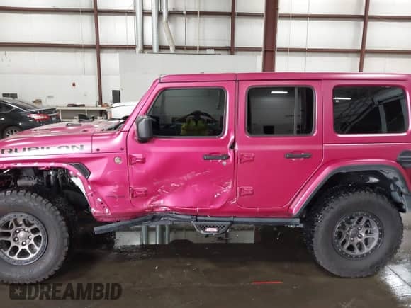 2022 Jeep Wrangler Unlimited Rubicon 392 with VIN 1C4JJXSJ9NW101235, listed as a IAAI auction lot 43192651 with 19,850 mi miles and . Bid and sale history available at DreamBid. Image 14.