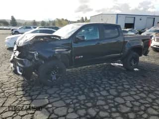 2018 Chevrolet Colorado 4WD Z71 with VIN 1GCGTDEN8J1323662, listed as a Copart auction lot 84644425 with 84,990 mi miles and Salvage title. Bid and sale history available at DreamBid. Image 1.