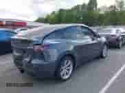 2021 Tesla Model Y Long Range with VIN 5YJYGAEE6MF251590, listed as a IAAI auction lot 43066576 with 33,937 mi miles and . Bid and sale history available at DreamBid. Image 4.