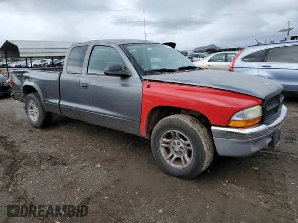 2002 Dodge Dakota с VIN 1B7GL12XX2S718443, выставлен на аукционе Copart как лот 84568934 с пробегом 122 127 миль миль и Чистый • Clean title. История ставок и продаж доступна на DreamBid. Изображение 4.