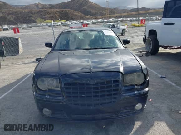 2007 Chrysler 300 C SRT-8 with VIN 2C3LA73W37H658358, listed as a IAAI auction lot 43439006 with 175,088 mi miles and . Bid and sale history available at DreamBid. Image 12.