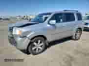 2012 Honda Pilot Touring with VIN 5FNYF3H98CB019682, listed as a Copart auction lot 71929055 with 120,705 mi miles and Salvage title. Bid and sale history available at DreamBid. Image 1.