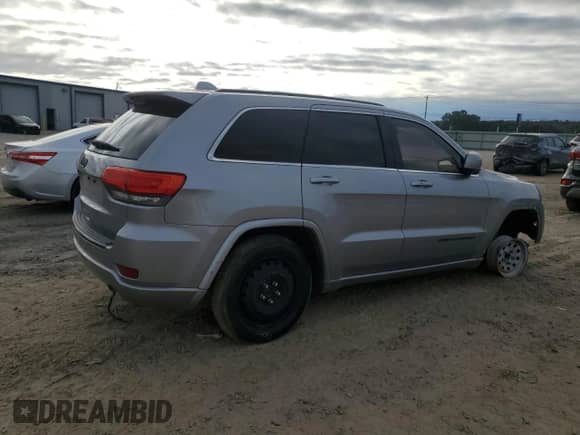 2014 Jeep Grand Cherokee Laredo with VIN 1C4RJEAG2EC556071, listed as a Copart auction lot 83827295 with Not provided miles and Clean title. Bid and sale history available at DreamBid. Image 3.