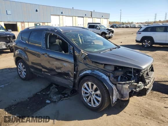 2017 Ford Escape Titanium с VIN 1FMCU0JD7HUE05582, выставлен на аукционе Copart как лот 90295055 с пробегом 51 904 миль миль и Чистый • Clean title. История ставок и продаж доступна на DreamBid. Изображение 4.