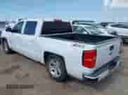 2018 Chevrolet Silverado 1500 LT with VIN 3GCUKREC6JG561917, listed as a IAAI auction lot 42694194 with 111,454 mi miles and . Bid and sale history available at DreamBid. Image 3.