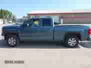 2014 GMC Sierra 1500 SLE z VIN 1GTV2UECXEZ180357, wystawiony jako IAAI lot #43225247 z przebiegiem 126 594 mil mil oraz . Historia ofert i sprzedaży dostępna na DreamBid. Obrazek 19.