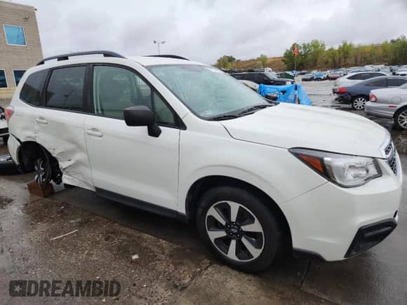 2018 Subaru Forester with VIN JF2SJABC5JH415175, listed as a Copart auction lot 71527095 with 102,783 mi miles and Salvage title. Bid and sale history available at DreamBid. Image 4.