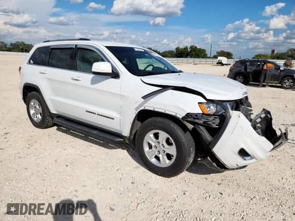 2017 Jeep Grand Cherokee Laredo with VIN 1C4RJEAG4HC638436, listed as a Copart auction lot 71111405 with 82,070 mi miles and Salvage title. Bid and sale history available at DreamBid. Image 4.