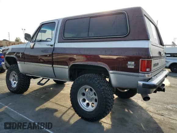 1986 Chevrolet Blazer with VIN 1G8EK18L6GF175066, listed as a Copart auction lot 43594865 with 34,731 mi miles and Salvage title. Bid and sale history available at DreamBid. Image 2.